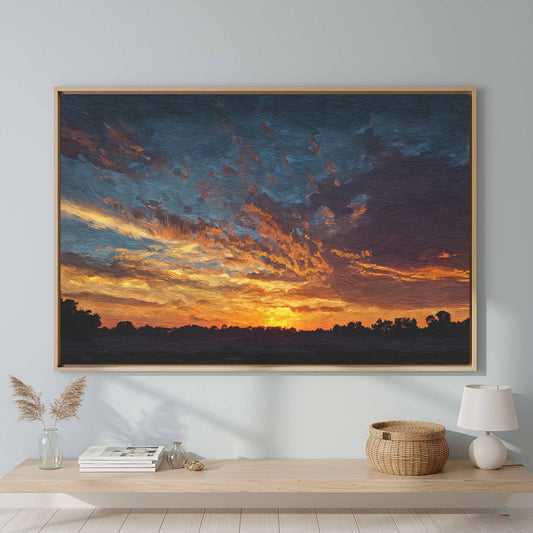 Dramatic Sunset Sky Canvas Print – canvas print shown framed in a styled room