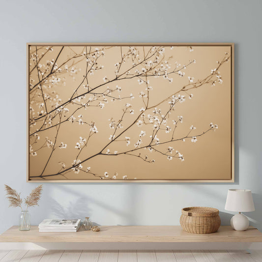 White Blossom Branch Canvas Print – canvas print shown framed in a styled room