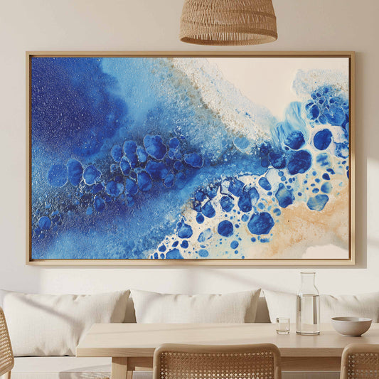 Abstract Blue Canvas Wall Art – canvas print shown framed in a styled room