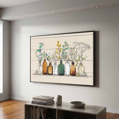 Botanical Glass Bottles Wall Art – canvas print shown framed in a styled room